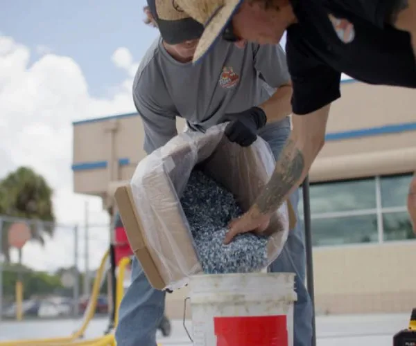 floortek worker prepping for floor coating